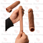 16 cm gerçekçi silikon penis kılıfı, 3 cm uzatma sağlayan damarlı model.